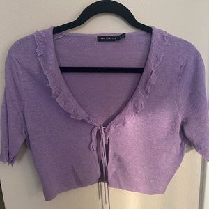 Purple cropped cardigan with ruffles and front tie